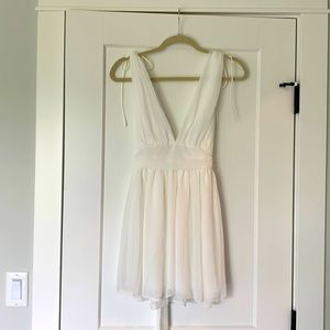 Beautiful chiffon dress. Brand new, never worn dress, missing tags